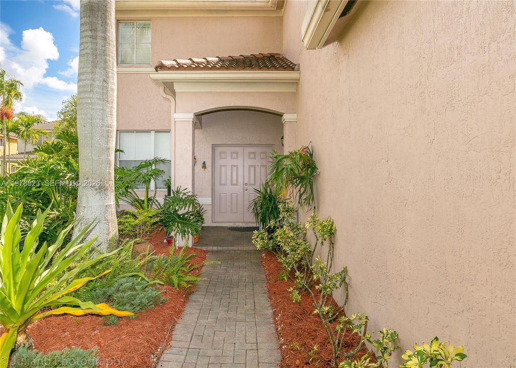 Photo of 1032 Silktree Ln, Weston, FL 33327 (MLS # A11978823)