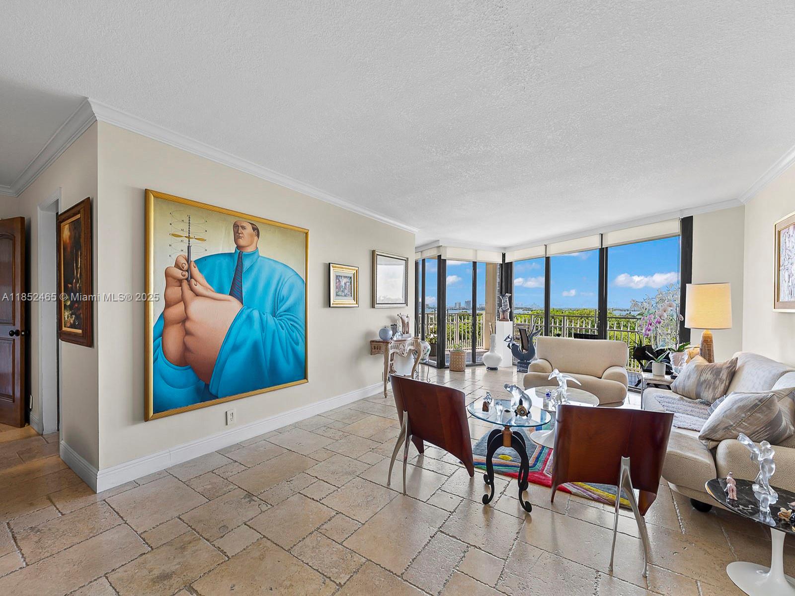 Welcome to your waterfront oasis at The Towers of Quayside. This spacious 2-bed, 2-bath split floor plan condo on the 7th floor has been thoughtfully updated with a touch of Spanish charm. Enjoy breathtaking panoramic views of Biscayne Bay and the Miami skyline from your large, private balcony.
The split bedroom layout provides ultimate privacy. The secure, 34-acre gated community offers an impressive list of amenities, including a full spa, fitness center, multiple pools, eight tennis courts, restaurants, and a marina. Experience a vibrant, active lifestyle in this world-class community.
This is an exceptional property. Don't miss your chance to make it yours!