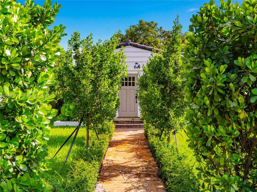 Timeless Charm Meets Modern Elegance.
Charming 1938 Spanish-style home nestled on a lush corner lot in Biscayne Park, thoughtfully updated while keeping its original character. Features include vaulted ceilings, oak floors, new impact windows and doors, a fully renovated kitchen with new cabinetry and appliances, and a beautifully redone bathroom. A versatile detached structure—perfect as a garage, creative Artist studio, den, or 3rd bedroom with ample space to easily add a second bathroom opens to a private courtyard garden. The backyard has a large wood deck and plenty of room for a pool, the possibilities are endless. Nearly an acre of open green space in front—perfect for relaxing or play.
This one-of-a-kind property is a rare gem—come experience its magic for yourself.