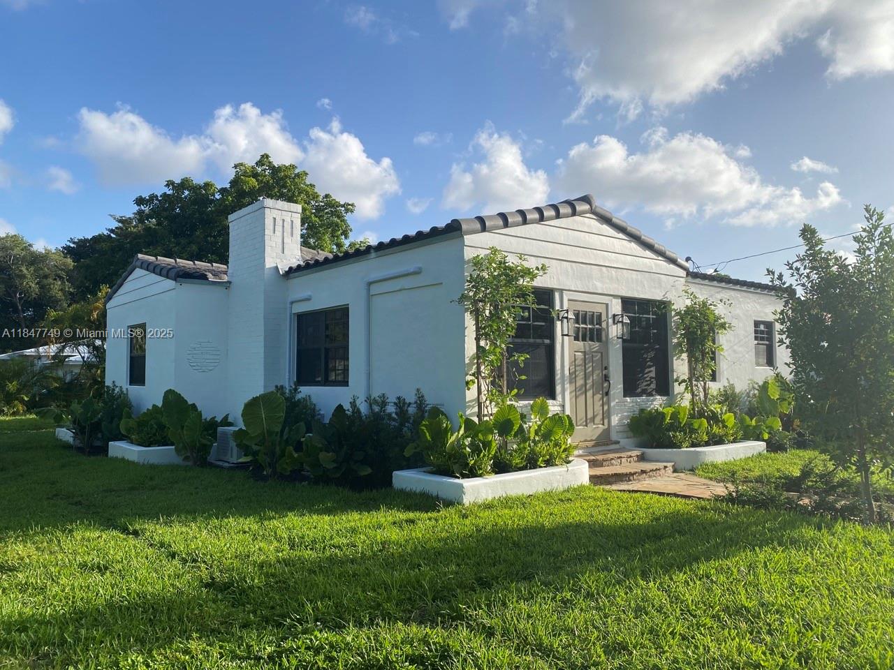 Timeless Charm Meets Modern Elegance.
Charming 1938 Spanish-style home nestled on a lush corner lot in Biscayne Park, thoughtfully updated while keeping its original character. Features include vaulted ceilings, oak floors, new impact windows and doors, a fully renovated kitchen with new cabinetry and appliances, and a beautifully redone bathroom. A versatile detached structure—perfect as a garage, creative Artist studio, den, or 3rd bedroom with ample space to easily add a second bathroom opens to a private courtyard garden. The backyard has a large wood deck and plenty of room for a pool, the possibilities are endless. Nearly an acre of open green space in front—perfect for relaxing or play.
This one-of-a-kind property is a rare gem—come experience its magic for yourself.