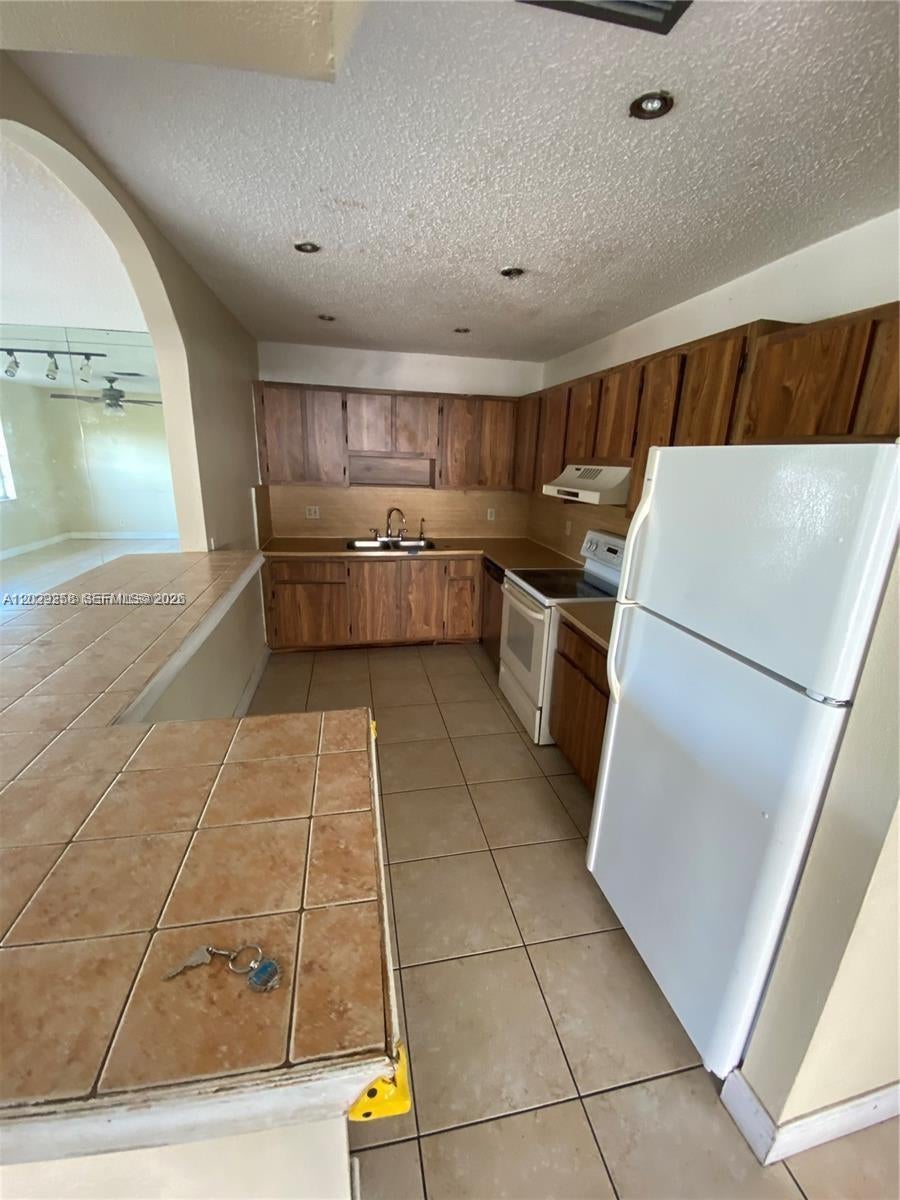 Photo of 6162 SW 5th St, Margate, FL 33068 (MLS # A12029258)