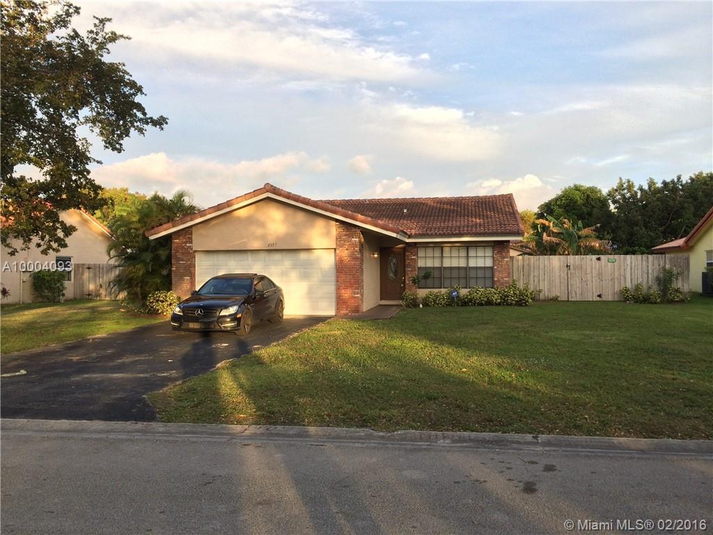 Completely remodeled Coral Springs pool home with fenced in yard and no HOA. This house has been upgraded throughout and features gourmet kitchen with granite and stainless steel appliances, renovated bathrooms ( one with a jacuzzi tub ), and upgraded floors and light fixtures. This house is priced to move.