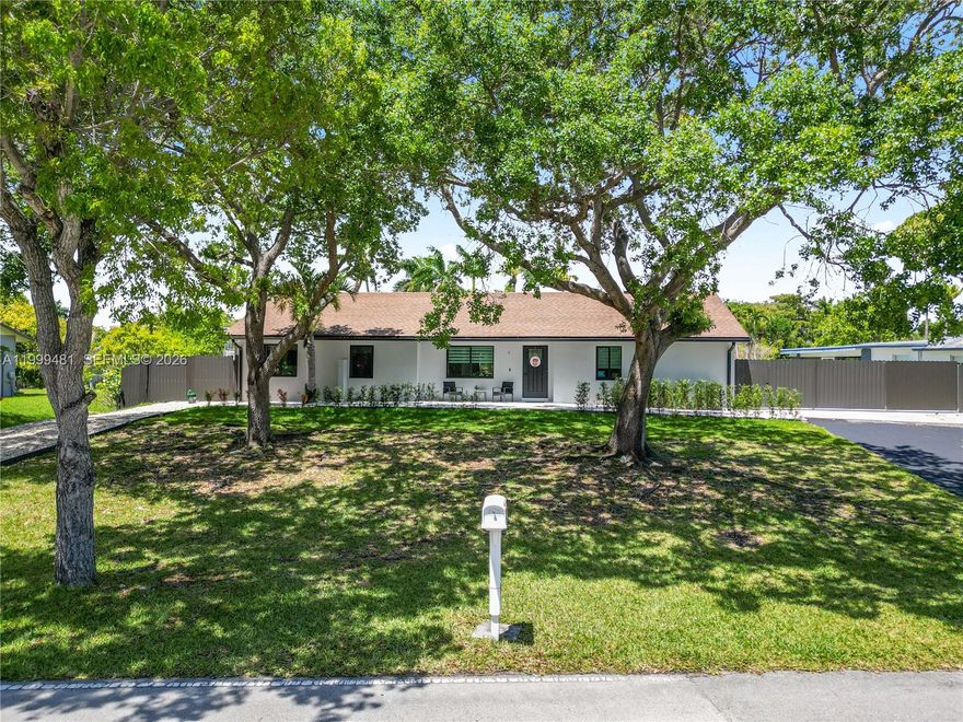 STUNNING North Cutler Bay gem in a highly sought-after location! This fully upgraded 3-Bedroom 2-Bath home features a show-stopping kitchen with massive Quartz waterfall island and continuous Quartz backsplash, this home is designed for everyday living and entertaining. Enjoy peace of mind with all impact windows and doors, PVC plumbing, and fully remodeled bathrooms. This home showcases a seamless look with the same tile flooring throughout, complemented by recessed lighting for a sleek, modern ambiance. The primary suite is your own private retreat, complete with a separate shower and a standalone soaking tub. A versatile additional living area with laundry provides flexible use- perfect for a playroom, home office, or multi-purpose space. Situated on an expansive 16,117 sq ft lot this property is a dream for boat or RV owners. The property offers two double gates, parking for RV’s, boats, or multiple vehicles, and dedicated concrete slabs for additional storage. Two sheds provide ample storage space, making this property as practical as it is beautiful.  A rare combination of style, space, and functionality- this is South Florida living at its best. Our community has many family events like golf cart parades, chili cook-offs, wing-fests and much more. Just minutes from downtown Cutler Bay, the Turnpike, and popular Black Point Marina.