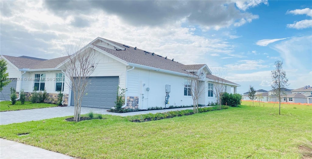 Photo of 1365 Haywagon Trl, Loxahatchee, FL 33470 (MLS # A11490674)