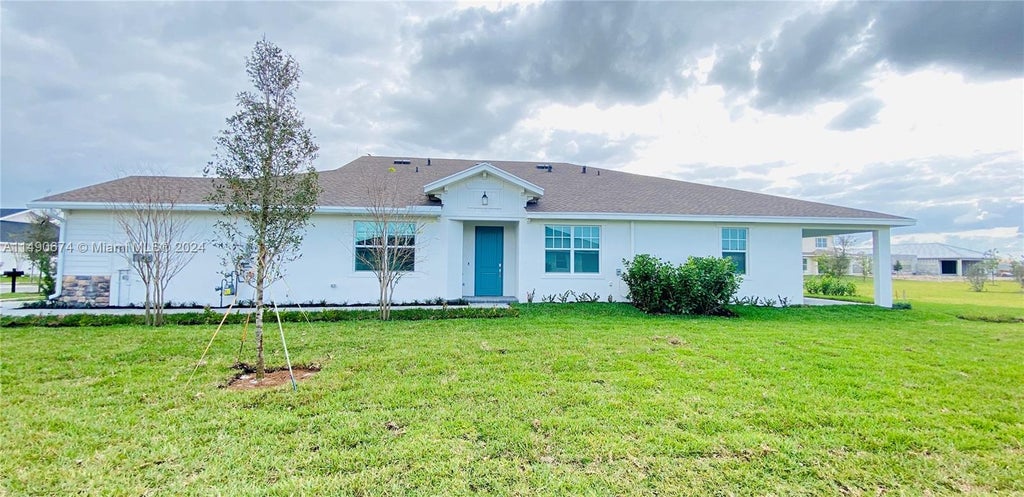 Photo of 1365 Haywagon Trl, Loxahatchee, FL 33470 (MLS # A11490674)