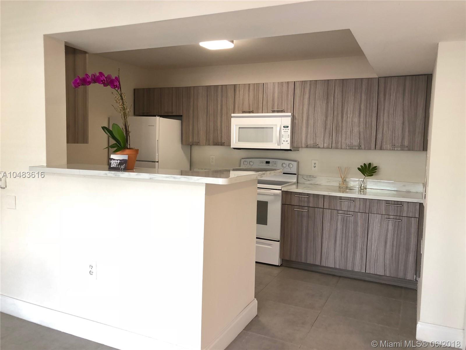 A modern and refreshing unit in a prime location! This condo sits in a quiet and friendly community in the Hammocks. It has been upgraded with modern finishes and features a private washer and dryer. Feel at home the instant you walk in and realize all it needs is your furniture. It is freshly painted and cleaned, ready for move in. Easy to show and client is ready to sell!