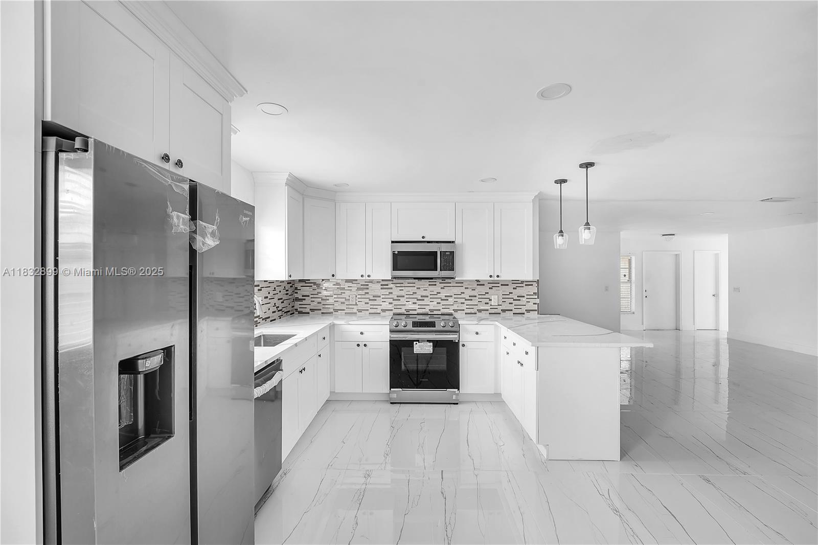 Step into luxury and comfort in this beautifully renovated 3-bedroom, 2-bathroom single-family home located in the desirable Sandalfoot Cove neighborhood. This bright and spacious home offers modern finishes, an open-concept layout, and thoughtful upgrades throughout.