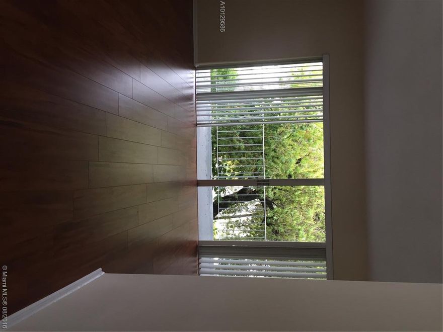 Beautiful 1 Bedroom, 1 Bathroom, 2nd Floor, Corner Unit, Village at Dadeland Condo. Features New Mahogany Laminate Flooring in Bedroom and Living Areas, Spacious Master Bedroom with Multiple Closets, Large Dinning Room / Living Room and an Open Porch with Garden Views. Conveniently Located Community with Private Walking Bridge to Luxurious Dadeland Mall. Close to Major Highways, Public Transportation, Shopping and Restaurants.