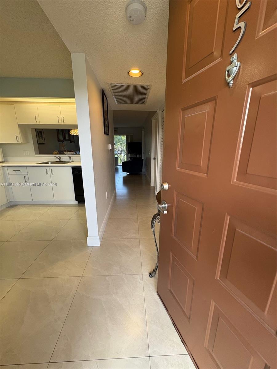 Welcome to Your Dream Home in Century Village!
Live the good life in this bright and spacious 2-bed, 1.5-bath condo in the sought-after 55+ gated community of Century Village, Pembroke Pines (33027). Enjoy a large living room that opens to a screened balcony, perfect for relaxing. Features include a brand-new A/C and microwave, tile floors, hurricane shutters, tankless water heater, in-unit washer/dryer, and elevator access.
Steps from the Pembroke Rd gatehouse and packed with resort-style amenities: a stunning clubhouse, fitness center, pools, tennis, golf, movie theater, live Vegas-style shows, and free shuttle service to local shopping and grocery stores. Come experience vibrant, carefree living at its best!