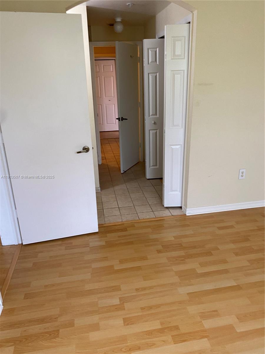 THE COURTS AT DORAL ISLES - Residential Lease