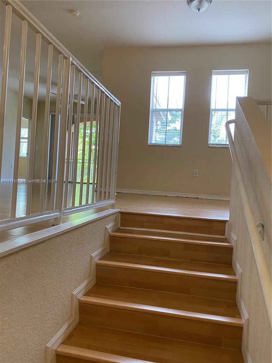 THE COURTS AT DORAL ISLES - Residential Lease