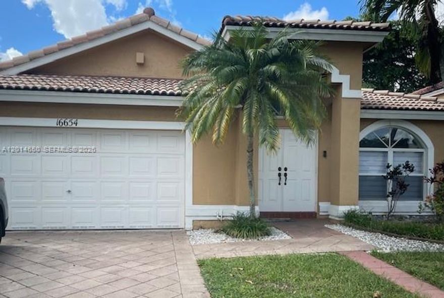 Come see this beautiful, turnkey single family, double car garage, paver driveway, one-story home in a great location full of infrastructure around such as parks, shoppes, supermarkets, and dining. As you enter, you will see the high ceilings leading to the living area, dining room, huge kitchen and family room. The sliders will lead to an inviting back yard with a built-in bbq grill and enough space to entertain and even build a future pool. As you return to the interior, retreat toward 4 bedrooms and 2 full baths that have been remodeled and look amazing. The house passes the 4-point wind mitigation due to its accordion shutters throughout, reinforced garage door and reinforced roof truss straps. House is vacant and ready to show, just contact listing agent to schedule your appointment.