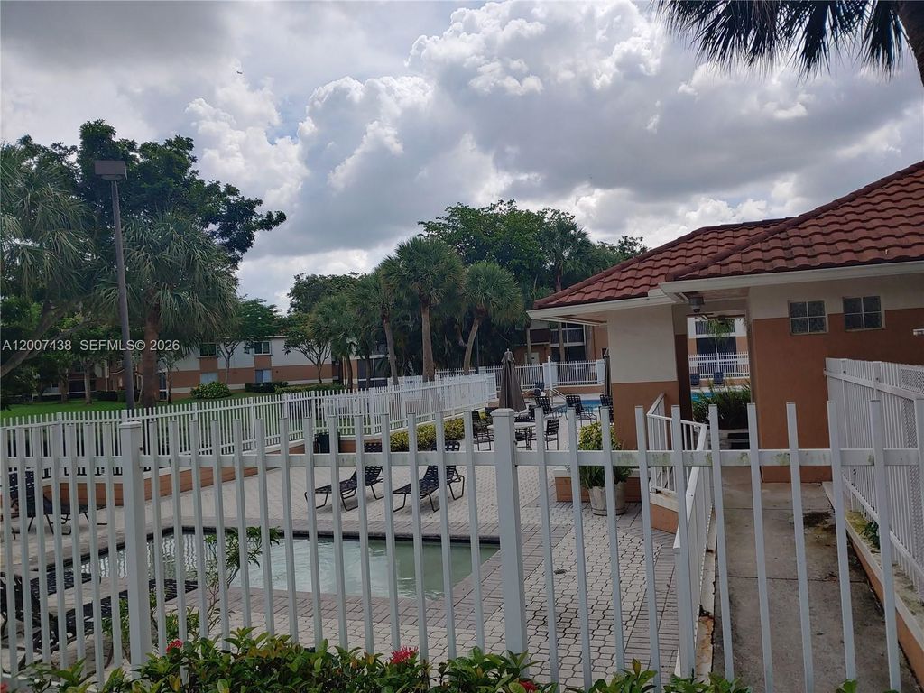 Photo of 704 NW 92nd Ave #704, Plantation, FL 33324 (MLS # A12007438)