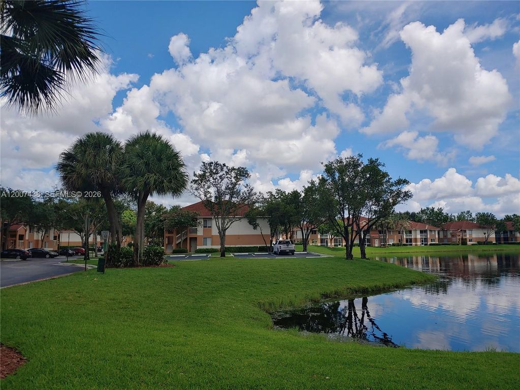 Photo of 704 NW 92nd Ave #704, Plantation, FL 33324 (MLS # A12007438)