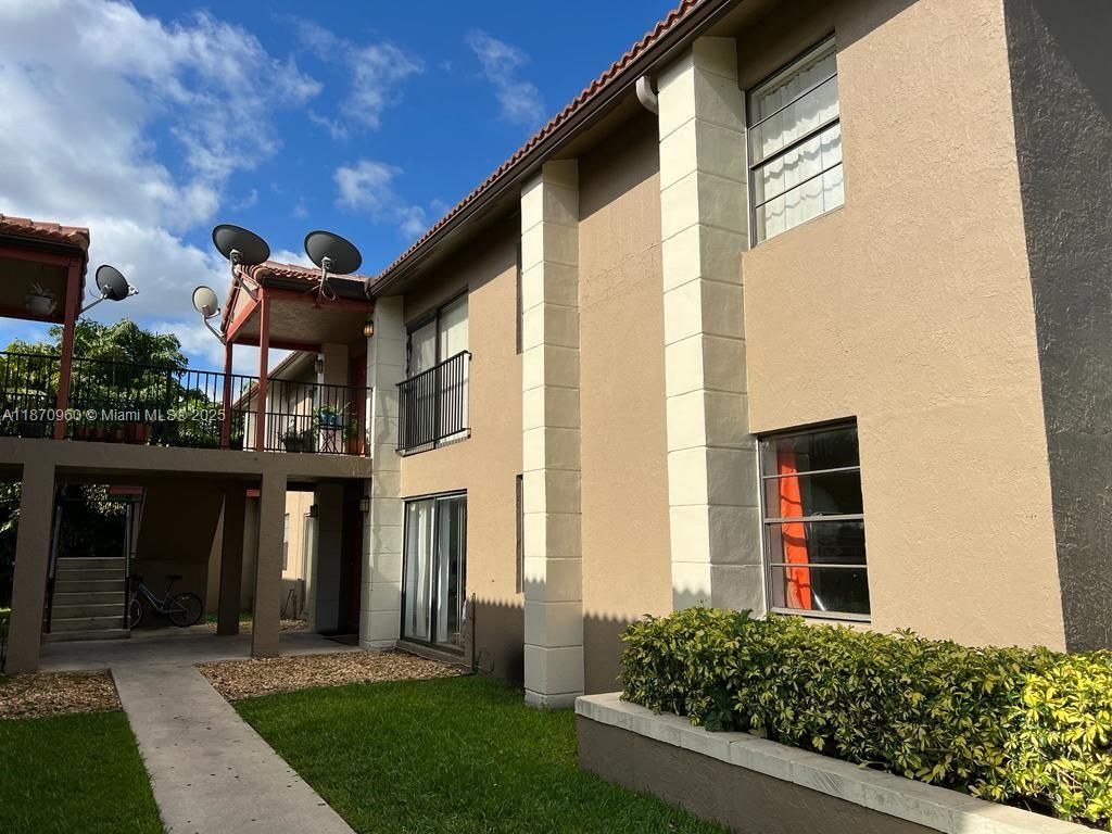 Photo of 3157 Coral Ridge Dr #3157, Coral Springs, FL 33065 (MLS # A11870960)