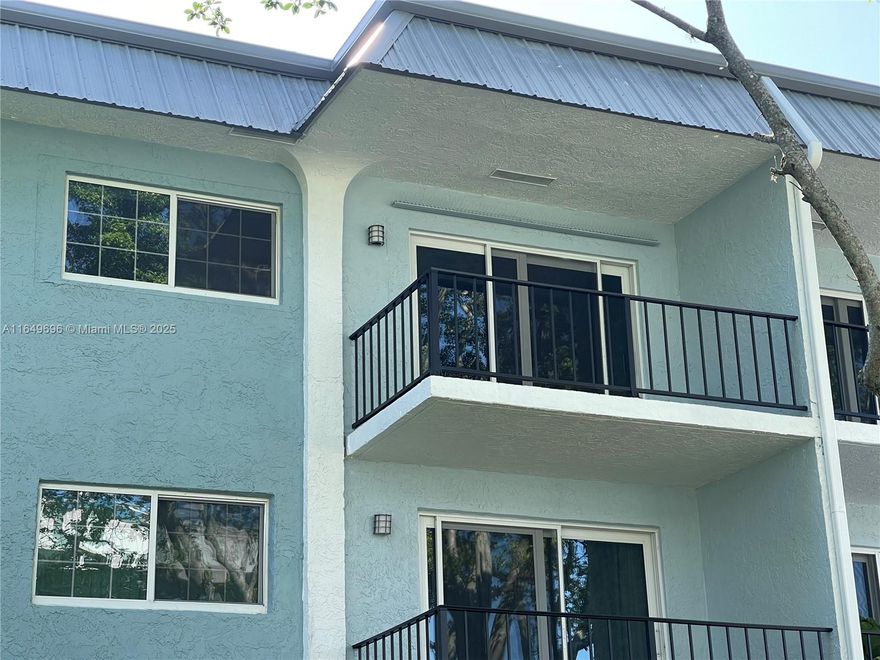 Best Price! No Assessments. A half mile to the restaurants, shops, & nightlife on Wilton Drive and 2.5 miles to the Beach. HOA has completed SIRS. Third floor 2 bed/2 bath with balcony facing the garden courtyard. Garden views from the living room & bedrooms. One assigned parking space & plenty of guest parking. Bedrooms are spacious with walk-in closets. Separate living & dining rooms. All windows & the living room sliding door are hurricane Impact Glass. Building roof & gutters replaced in 2022. Exterior building painted 2025. Community amenities include a heated pool, fob entry clubhouse with kitchen facility, & BBQ patio area. HOA fees include water, pest control, WiFi. Common laundry rooms on each floor & shared extra storage space on this floor. A grocery store is across the street.