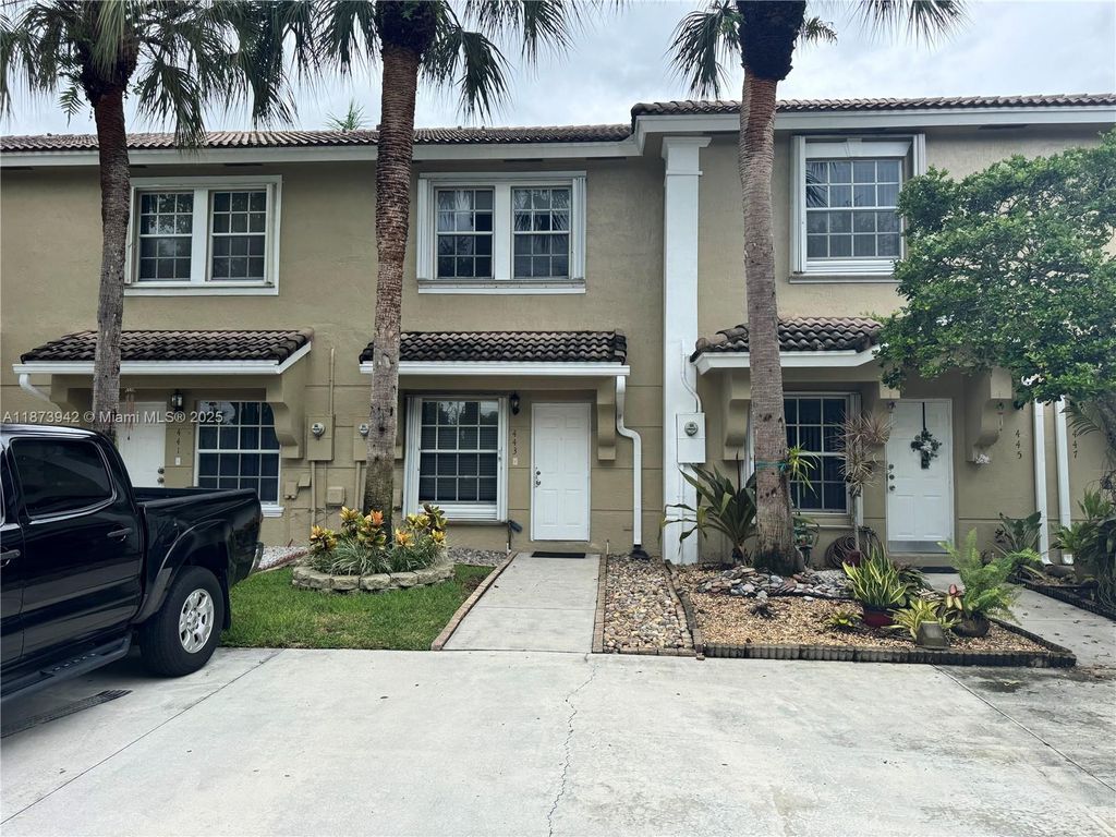 Photo of 443 SW 122nd Ter, Pembroke Pines, FL 33025 (MLS # A11873942)