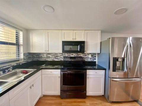 Photo of 8975 Palm Tree Ln #8975, Pembroke Pines, FL 33024 (MLS # A11983710)