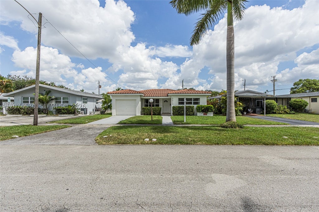 Photo of 3513 Polk St, Hollywood, FL 33021 (MLS # A12074530)