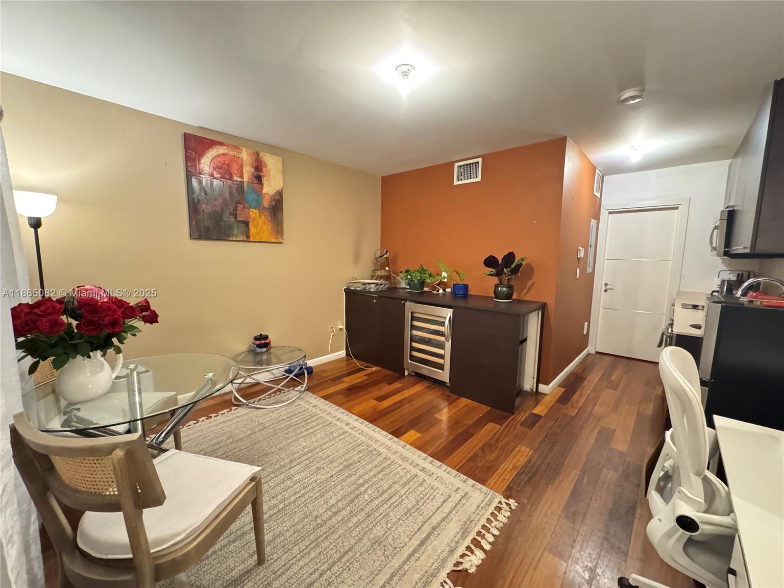 Location, Location, Location Just a block to Lincoln Rd. and walking distance to the beach. Wood floor throughout, stainless steel appliances, washer and dryer in the unit and Wi-Fi included in the rent.