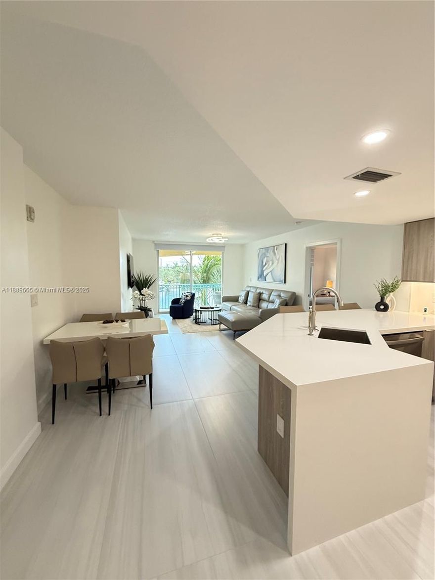 Enjoy stunning water views from this tastefully remodeled2/2 condo located in a sought-after boutique building. This stylish condo is being offered fully furnished.Spacious split floor layout for privacy and comfort. Modern open kitchen with top notch appliances. Elegant bathrooms with designer touches . Private balcony overlooking the water and multimillion dollar homes and yachts. In unit laundry. NEVER RENTED before.Steps from shopping, dining and the beach. Whether you are looking for short term or 1 year getaway - look no further. The condo offers luxury, convenience and coastal living. The unit is available for minimum rent of 3 months at $5500 per month. Also available for 6 months at $4500 and 12 months at $4000. Building requires a deposit. SCHEDULE YOUR PRIVATE SHOWING TODAY!
