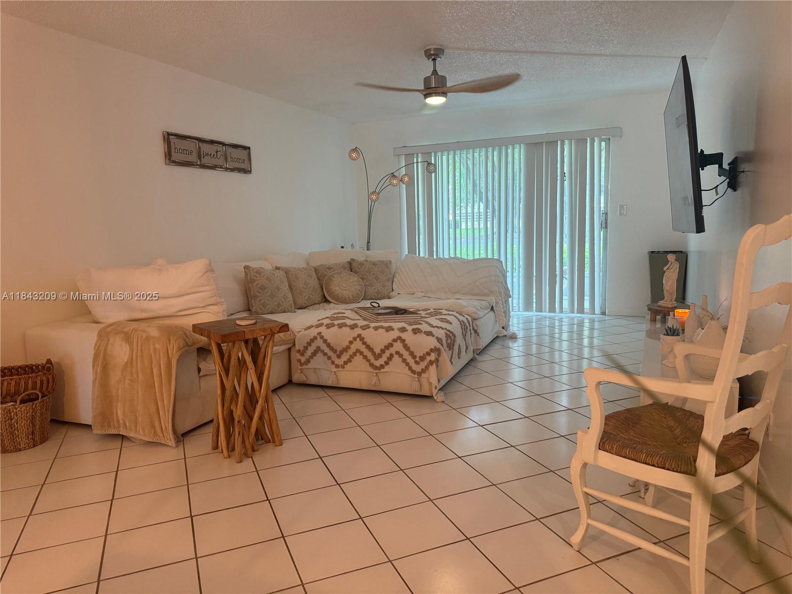 Excellent first-floor property with 2 bedrooms, 2 bathrooms, and a beautiful, spacious kitchen with stainless steel appliances. Tile floors throughout the condo. The tranquil sunroom provides the tranquility you seek. This highly rated community offers a heated pool, ballroom, tennis courts, pickleball courts, a sauna, a theater, a pharmacy, a fitness center, restaurants, and much more. This move-in-ready condo awaits its new owner.