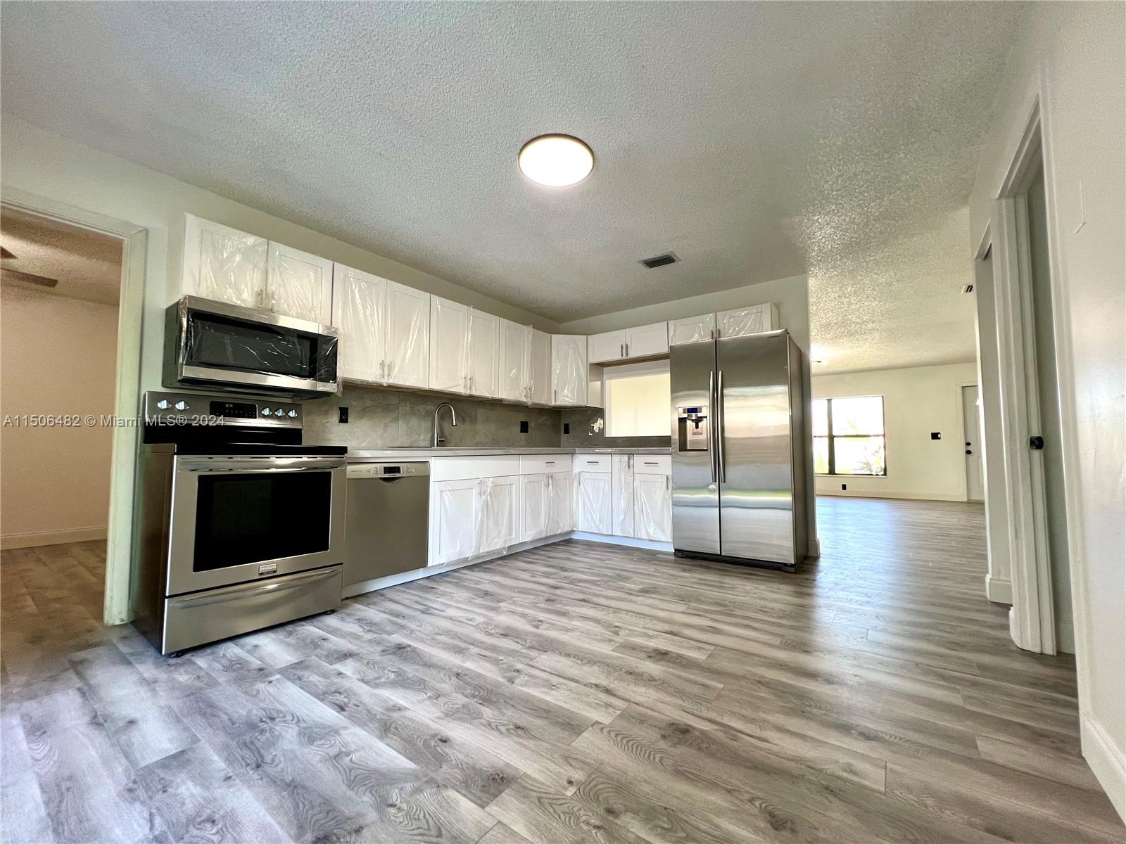 Newly renovated 4 bedroom 2 bathroom single story house. The house has a very large backyard. New kitchen with porcelain countertop/backsplash. Washer/Dryer. 1 car garage. Newly renovated glass-door walk in showers. Close to shopping centers. Close to schools.