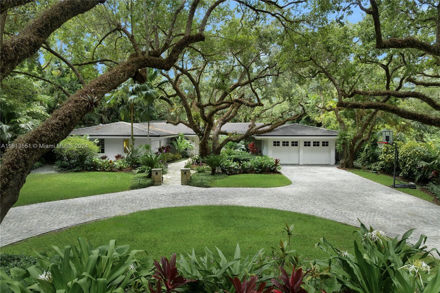 Tucked away on Ponce Davis’ most beautiful cul de sac, is a fully gutted, remodeled and expanded one story gem. Set far back from the street, a circular drive and Coral stone walkway lead through the front yard oaks and garden to the front door. The living, dining room and gallery are elegantly appointed with fine millwork and finishes. A sleek chefs kitchen features Viking gas stove, a custom commercial hood, large island, oversized butler’s pantry/wine fridge and bright breakfast rm overlooking the lagoon pool, expansive yard and enchanted orchid garden.The family room with vaulted ceiling opens to the terrace and summer kitchen. Viking, Liebherr,Bosch appliances,2018 Generator, electric car charger, auto shades. 2012 gut/remodel/expansion, electric & plumbing,2020 roof. Generous storage