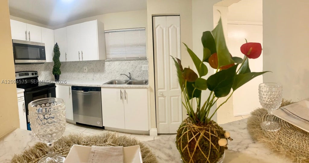 Photo of 4205 N University Dr #212, Sunrise, FL 33351 (MLS # A12094575)