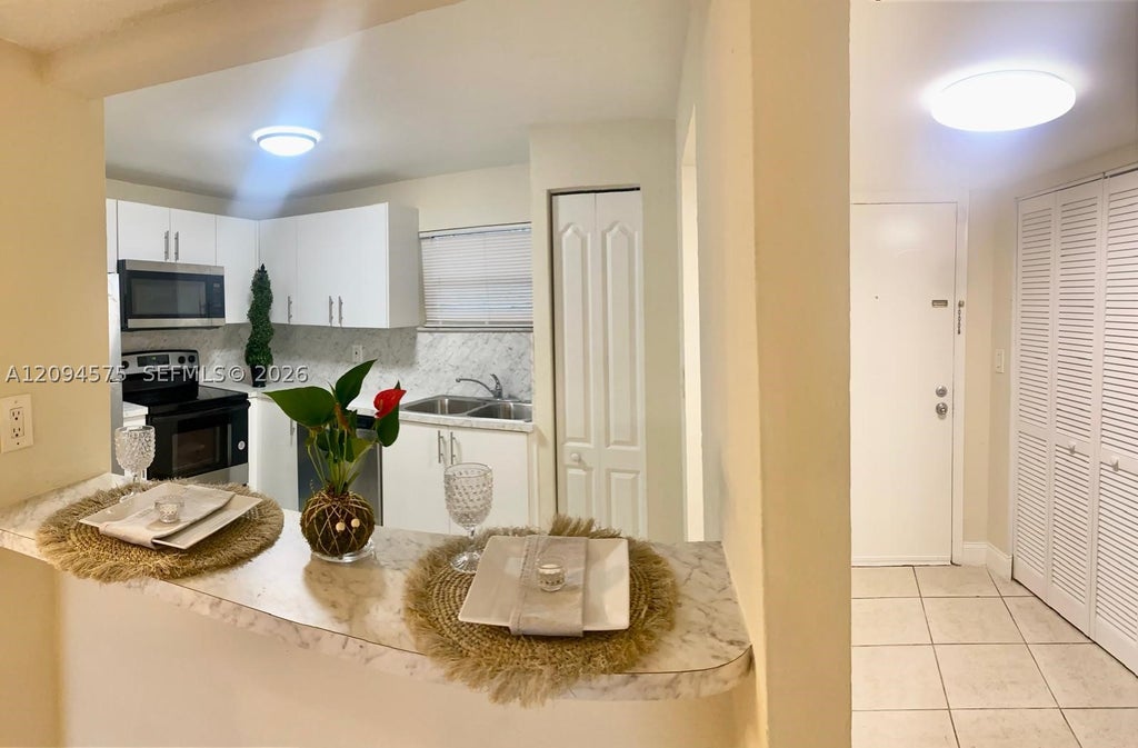 Photo of 4205 N University Dr #212, Sunrise, FL 33351 (MLS # A12094575)