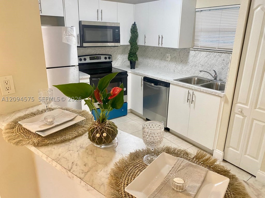Photo of 4205 N University Dr #212, Sunrise, FL 33351 (MLS # A12094575)