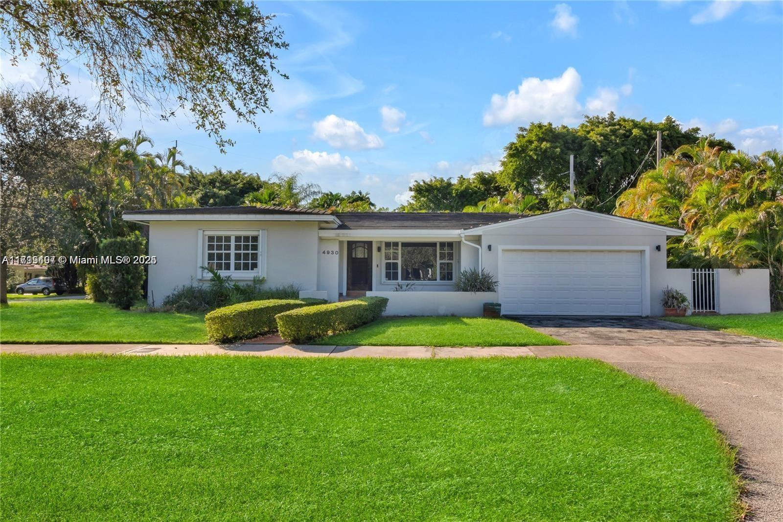 Charming corner home, centrally located. This home has 2 recently updated bathrooms, freshly painted, featuring gleaming hardwood floors, 3 spacious bedrooms, and 2 bathrooms. Two-car garage. Spacious and open floor plan, eat-in kitchen, family room overlooking the large fenced backyard—an excellent area near the Coral Gables Youth Center, schools, shops, houses of worship, and more.