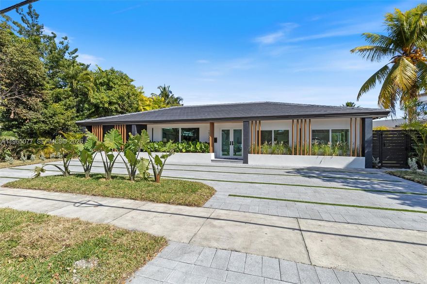 Prime lakefront home in prestigious Enchanted Lakes, fully renovated down to the studs with a new 2025 roof, all-new electrical and plumbing, new insulation, drywall, ductwork, and two high-efficiency A/C systems. Features include brand-new impact windows and doors, floor-to-ceiling Italian doors, an open-concept layout with high ceilings, MiaCucina Italian kitchen with brand-new Dacor luxury appliances, spa-style baths, wide-plank flooring, and LED lighting throughout. Actual area 3,104 square feet reflected in tax records; buyer to verify all measurements.

Exterior upgrades include a brand-new driveway, professional landscaping, a brand-new pool, and a completely new seawall and deck spanning the entire backyard—all just minutes from Aventura, beaches, major highways, and top schools.