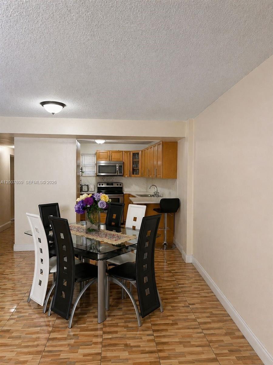 PALM-WEST GARDENS CONDO - Residential