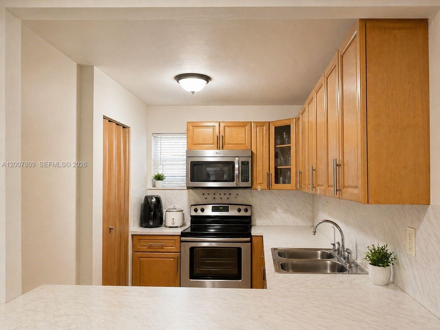 PALM-WEST GARDENS CONDO - Residential