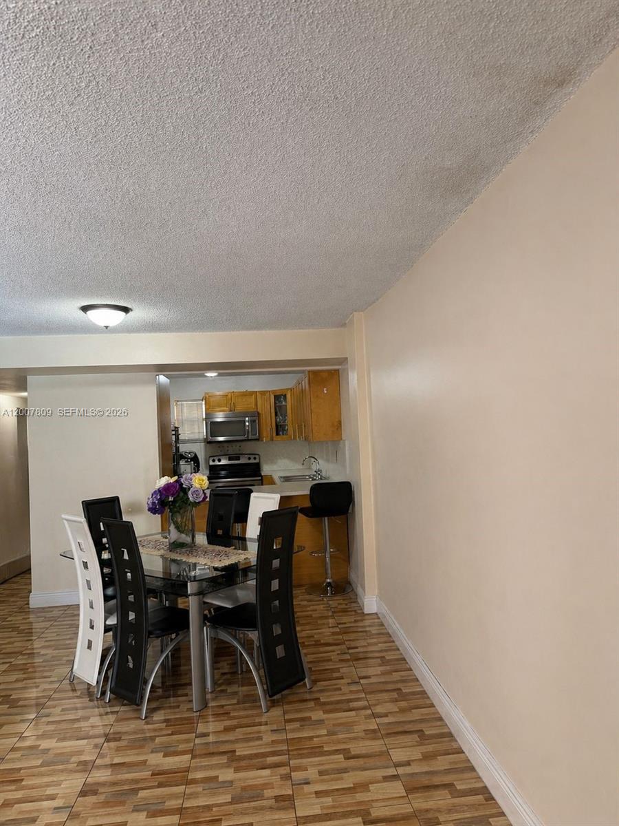 PALM-WEST GARDENS CONDO - Residential