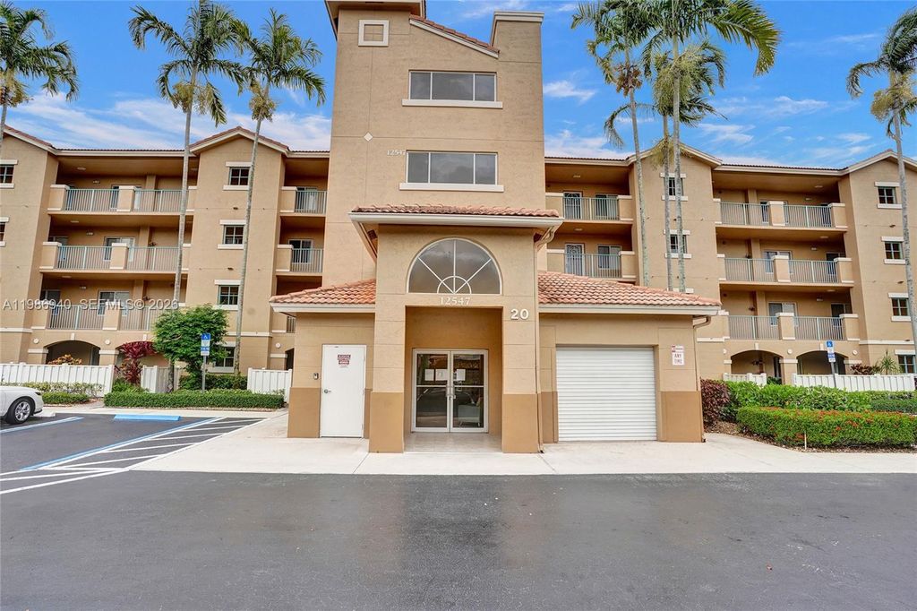 Photo of 12547 Imperial Isle Dr #206, Boynton Beach, FL 33437 (MLS # A11986940)