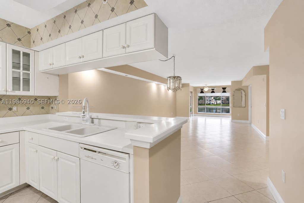 Photo of 12547 Imperial Isle Dr #206, Boynton Beach, FL 33437 (MLS # A11986940)