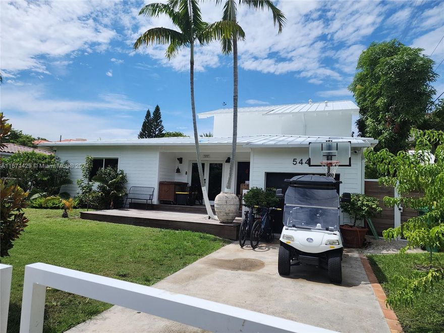 Stunning two-story home, updated in 2023, offering 2,850 sqft of luxurious living space. Nestled in Key Biscayne, this 3.5-bathroom gem features a large windowed walk-in closet that can be converted into an additional bedroom.

Step inside to charming Italian design, bathed in natural sunlight. The vaulted wood beam ceiling adds spaciousness, while the Italian open kitchen from Italkraft is equipped with new high-end appliances.

The one-car garage can be transformed into a fourth bedroom or office with its own ensuite bathroom. Enjoy peace of mind with impact windows and a brand-new roof.

The backyard is a tropical oasis, surrounded by a 12-foot hedge. A large pergola creates an inviting outdoor living space, ideal for relaxing or entertaining by the large, heated pool.