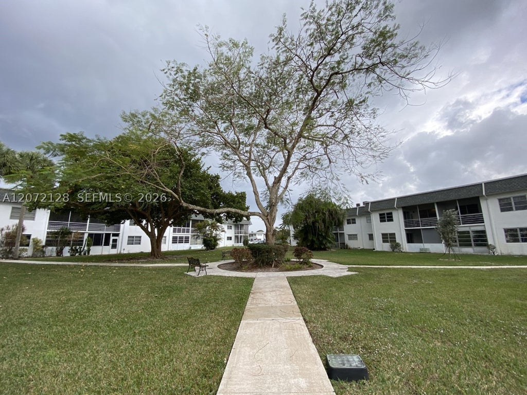 Photo of 6505 Winfield Blvd #B-25, Margate, FL 33063 (MLS # A12072128)