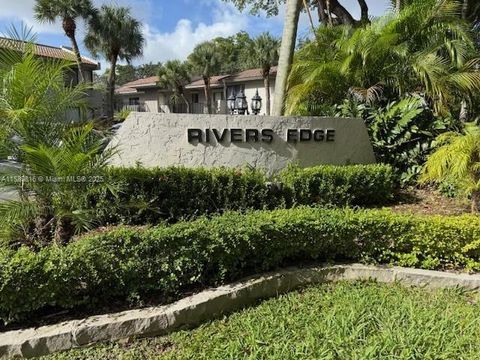 Photo of 9537 SW 1st Ct #9537, Coral Springs, FL 33071 (MLS # A11889816)