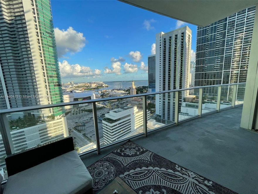2 Bed + Den | 3 bathrooms. Open layout, partly furnished (2nd bedroom is unfurnished. May be rented Unfurnished) with Bosch and Sub-Zero-equipped kitchen, and an in-unit washer/dryer. Residents also enjoy access to an impressive array of 46 amenities, including five pools, a spa, game rooms, a state-of-the-art fitness center with boxing studio, a basketball court, racquetball courts, soccer/football field, yoga facilities, an observatory, movie theater, jam room, and a recording studio, all within the PARAMOUNT Miami Worldcenter. Its proximity to the Brightline Train Station, Port of MIA, and Kaseya Center Arena, easy access to MIA Airport, Wynwood, Miami Beach, and other attractions makes it a modern and convenient lifestyle.