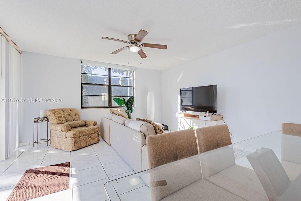 Photo of 6193 Rock Island Rd #119, Tamarac, FL 33319 (MLS # A11957847)