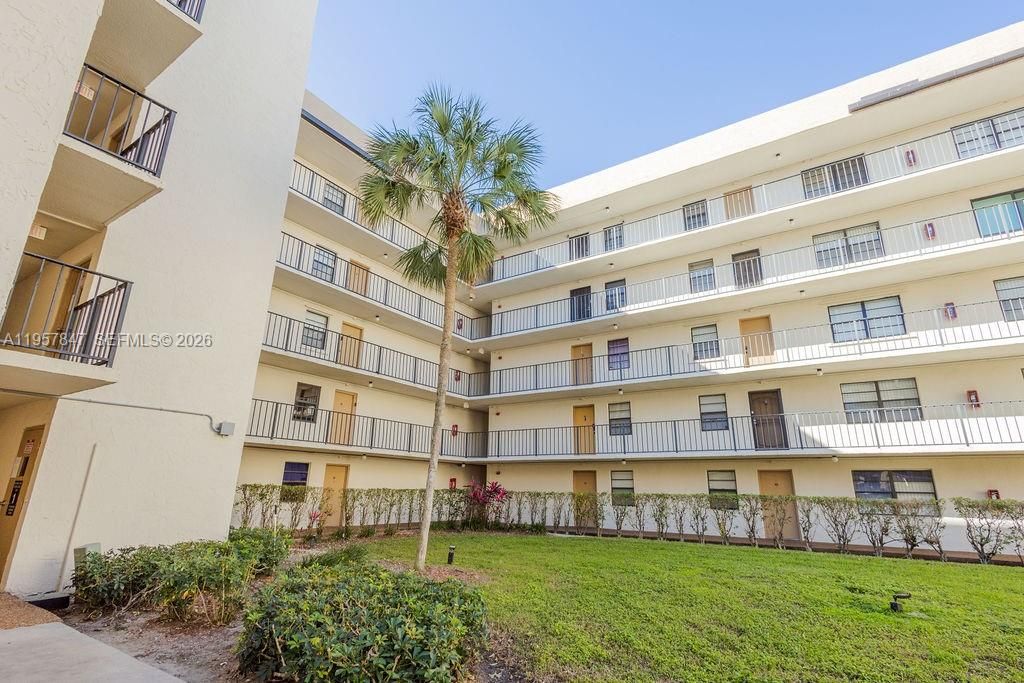 Photo of 6193 Rock Island Rd #119, Tamarac, FL 33319 (MLS # A11957847)