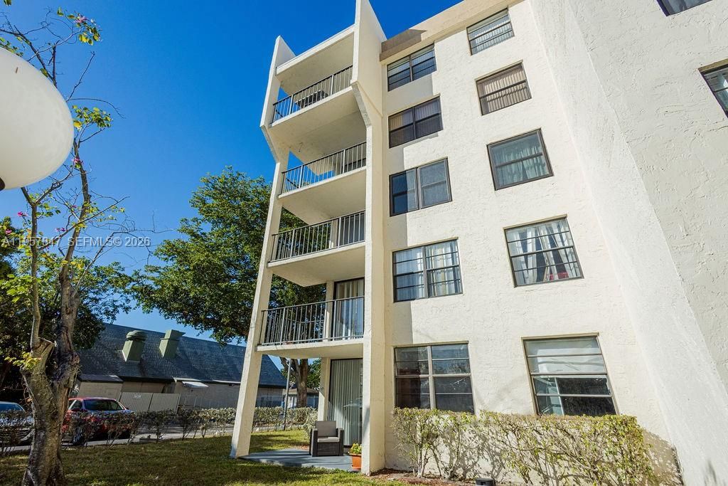 Photo of 6193 Rock Island Rd #119, Tamarac, FL 33319 (MLS # A11957847)