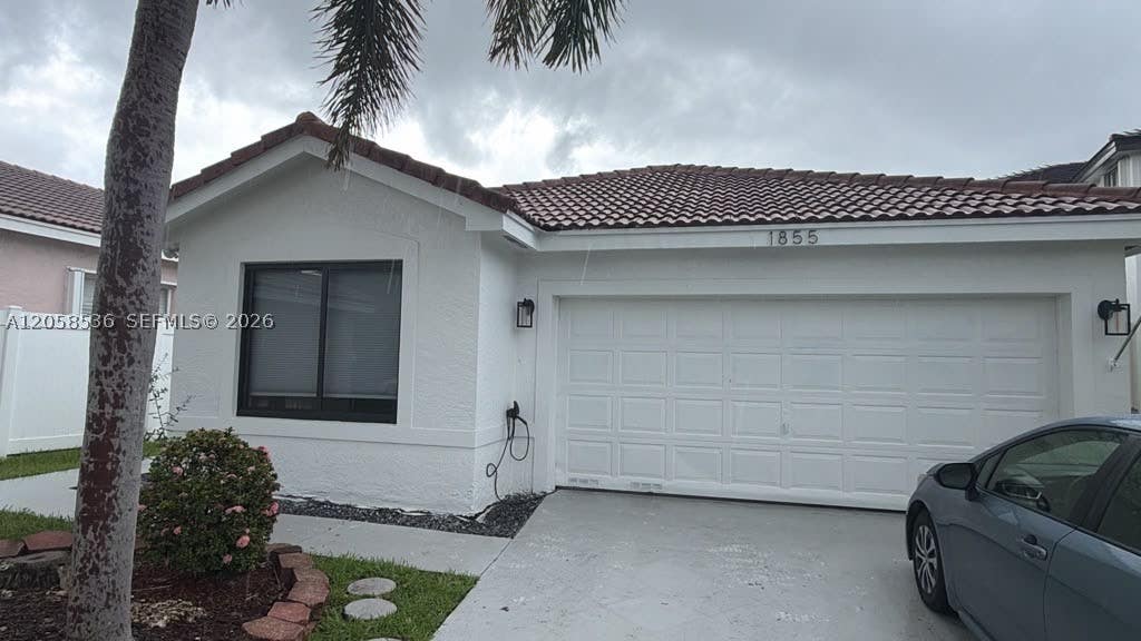 Photo of 1855 SW 177th Ter, Miramar, FL 33029 (MLS # A12058536)