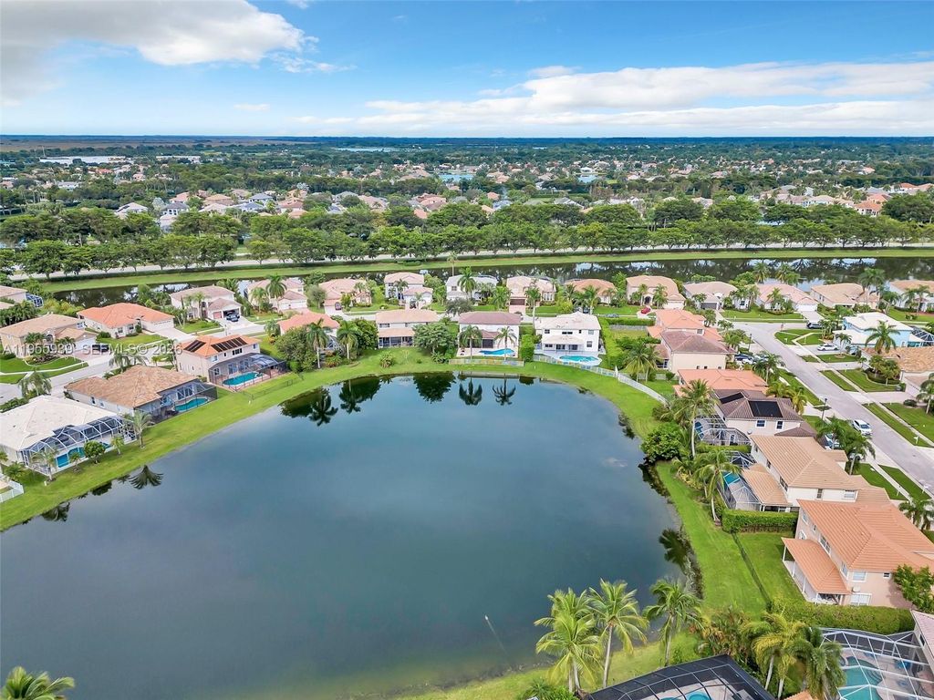 Photo of 12738 Maypan Dr, Boca Raton, FL 33428 (MLS # A11955939)