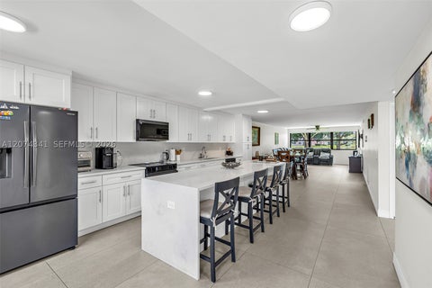 Photo of 2606 NW 104th Ave #102, Sunrise, FL 33322 (MLS # A12074341)