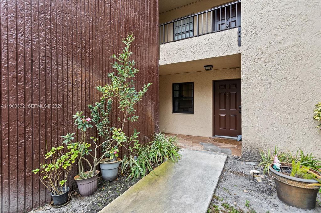 Photo of 10401 W Broward Blvd #111, Plantation, FL 33324 (MLS # A11960392)