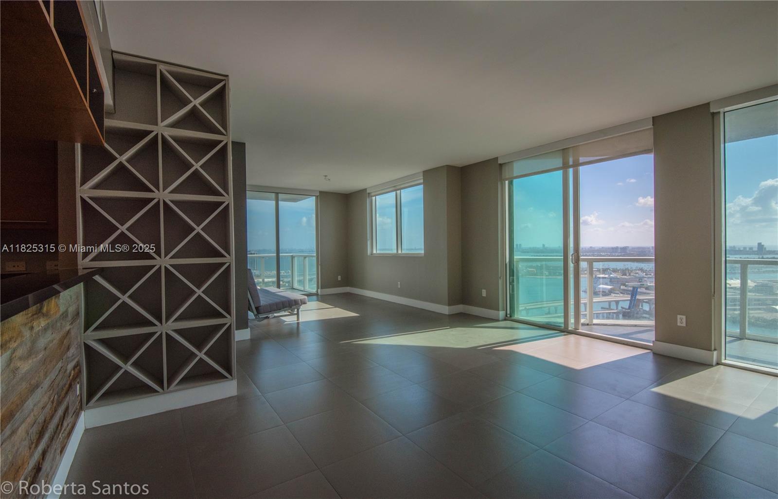 Modern 2BR/2BA condo in the heart of Downtown Miami! Enjoy stunning water and city views from this high-rise unit located across from Bayside and Port of Miami. Features include spacious bedrooms, sleek bathrooms, in-unit laundry, and 1 assigned parking space. Walk to shops, dining, and entertainment—prime urban living at its best!